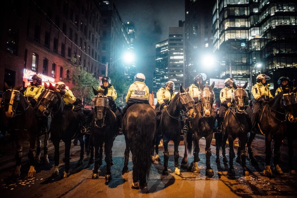 police officers on horses in protest