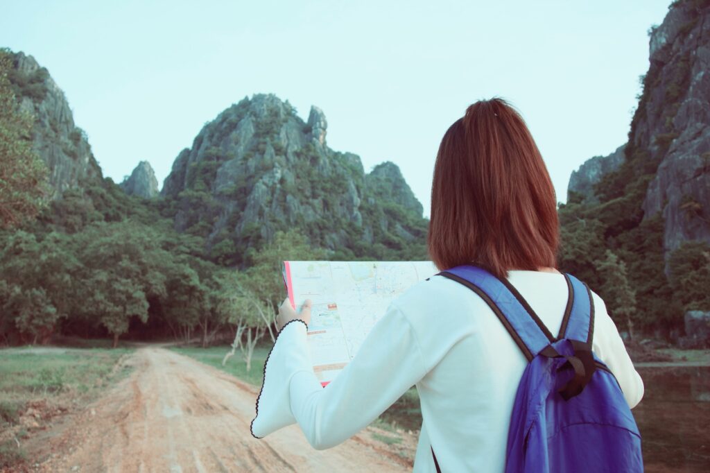 girl looking at map