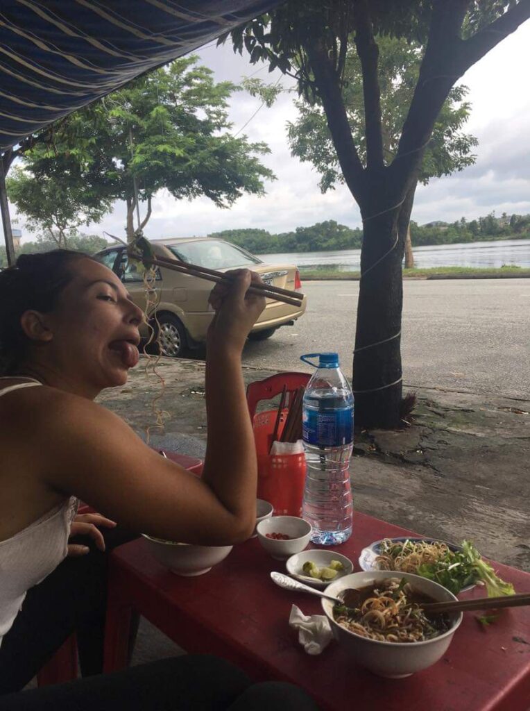 girl eating noodles