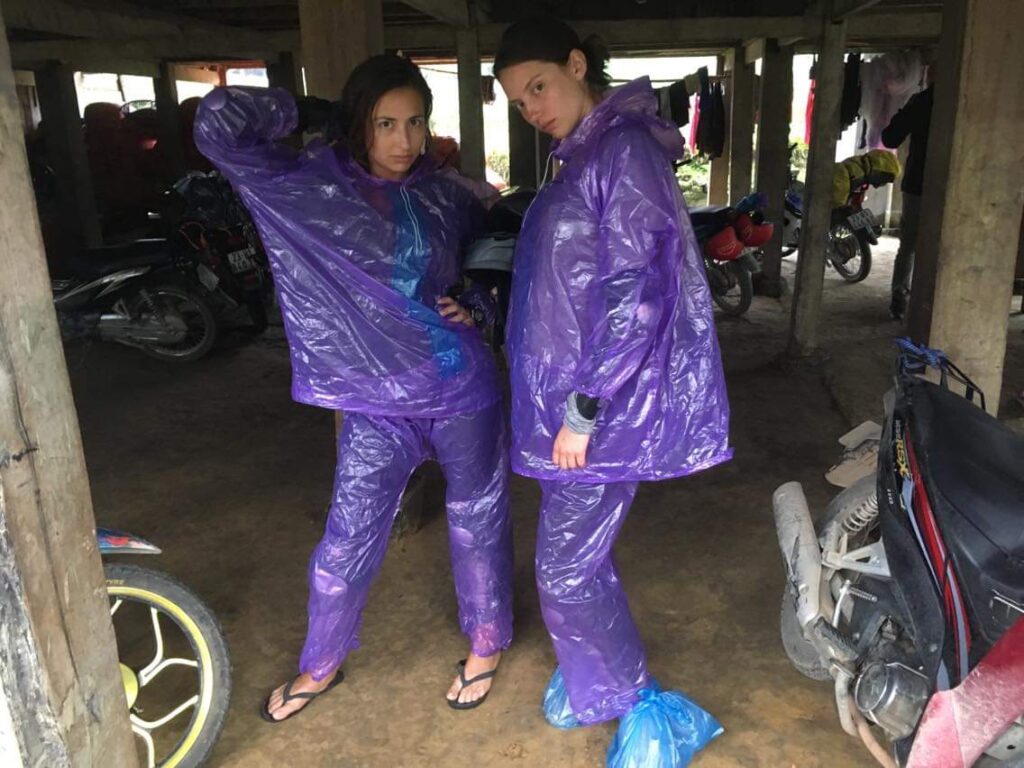 girls wearing plastic ponchos